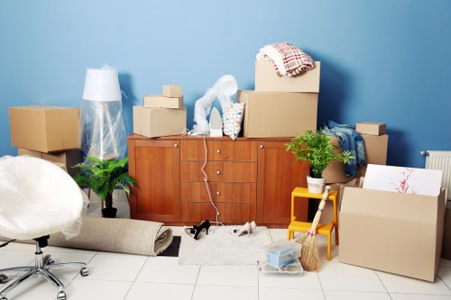 Packed office furniture and IT equipment ready for office removals in Denmarkhill