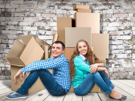 Professional movers transporting items during a small removal in Denmarkhill
