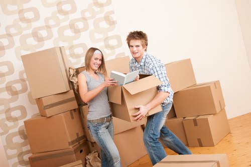 Careful loading of household items for a small removals job in Denmarkhill
